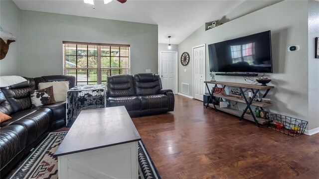 11746 Oswalt Rd, Clermont, FL 34711 - living area featuring vaulted ceiling, wood finished floors, and a ceiling fan