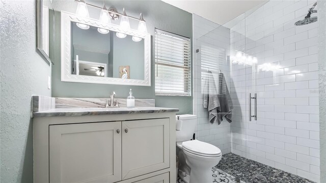 11746 Oswalt Rd, Clermont, FL 34711 - bathroom with a shower stall, vanity, and a textured wall
