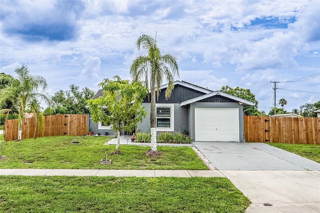 1244 Grandview Cir, Royal Palm Beach, FL 33411 - view of front of property with driveway, a garage, a gate, and stucco siding
