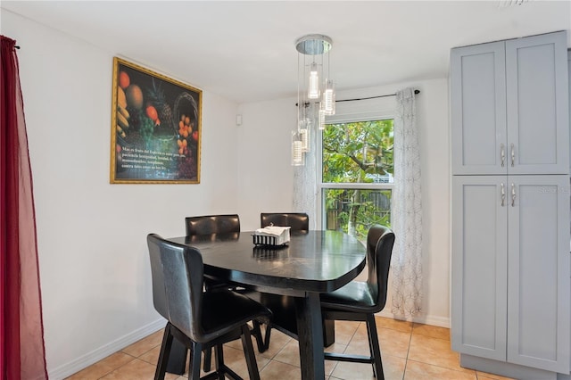 1244 Grandview Cir, Royal Palm Beach, FL 33411 - dining room featuring light tile patterned floors and baseboards