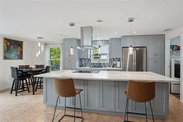 1244 Grandview Cir, Royal Palm Beach, FL 33411 - kitchen with freestanding refrigerator, gray cabinetry, light tile patterned floors, and plenty of natural light