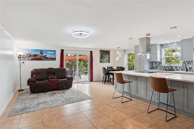 1244 Grandview Cir, Royal Palm Beach, FL 33411 - living area with plenty of natural light and light tile patterned flooring