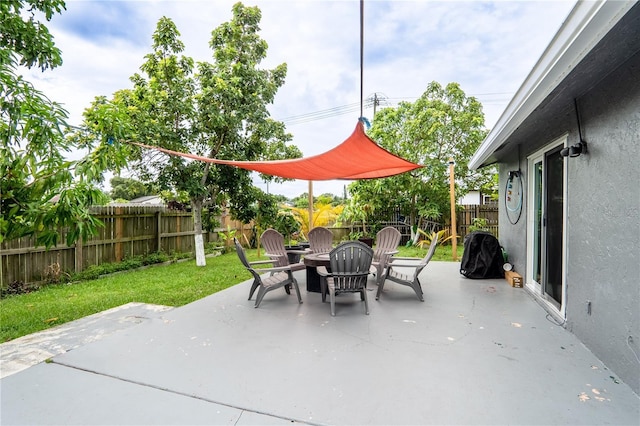 1244 Grandview Cir, Royal Palm Beach, FL 33411 - fenced backyard with a patio and a fire pit