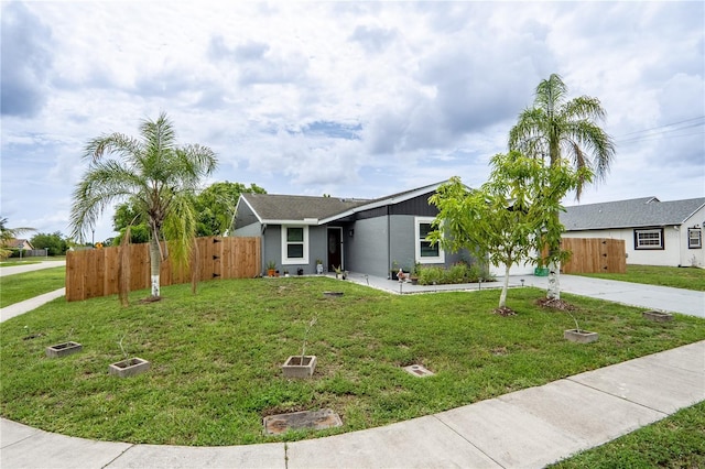 1244 Grandview Cir, Royal Palm Beach, FL 33411 - ranch-style home with concrete driveway and stucco siding