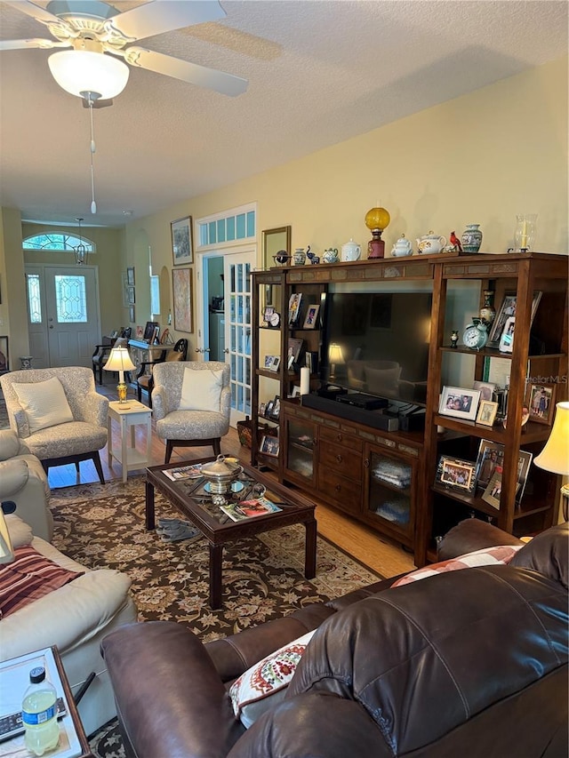 8301 Bridgeport Bay Cir, Mount Dora, FL 32757 - living area with ceiling fan and wood finished floors