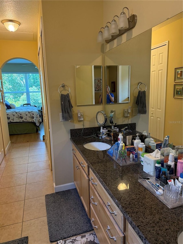 8301 Bridgeport Bay Cir, Mount Dora, FL 32757 - bathroom with tile patterned flooring, ensuite bathroom, and double vanity