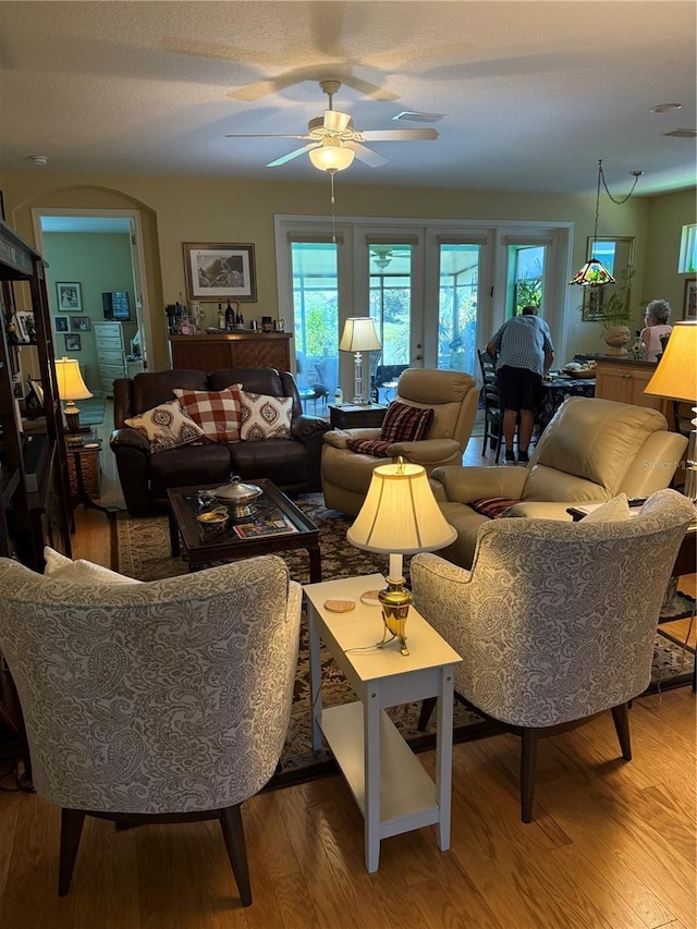 8301 Bridgeport Bay Cir, Mount Dora, FL 32757 - living area featuring a ceiling fan and wood finished floors