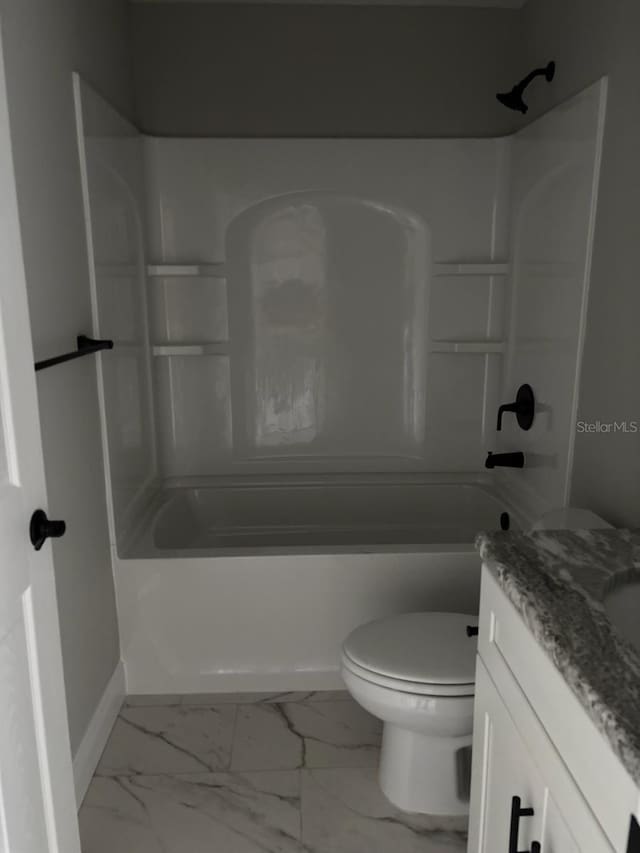 3838 W Baton Ln, Citrus Springs, FL 34433 - bathroom featuring vanity, marble look tiles, and  shower combination