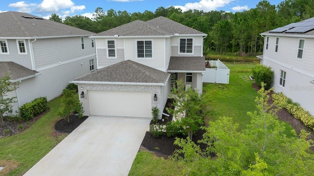 3916 Southern Vista Loop, Saint Cloud, FL 34772 - view of front of house featuring a shingled roof, concrete driveway, and an attached garage