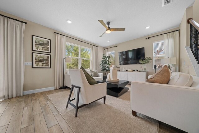 3916 Southern Vista Loop, Saint Cloud, FL 34772 - living area with a ceiling fan, light wood-style flooring, and recessed lighting