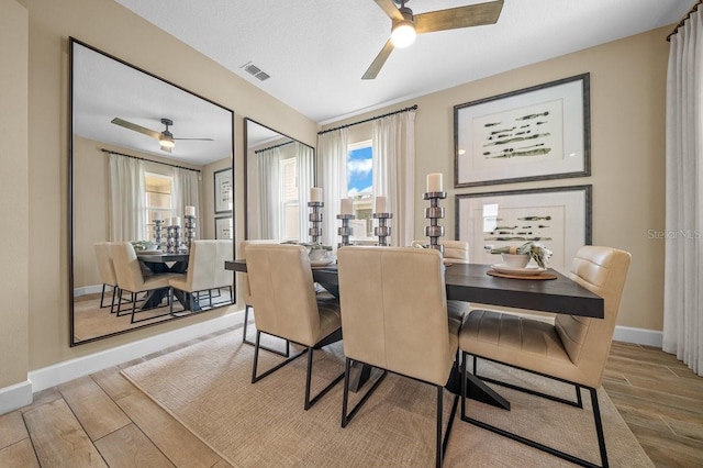 3916 Southern Vista Loop, Saint Cloud, FL 34772 - dining space with a ceiling fan and wood finished floors