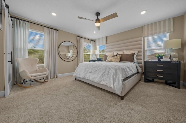 3916 Southern Vista Loop, Saint Cloud, FL 34772 - carpeted bedroom with multiple windows, a ceiling fan, and recessed lighting