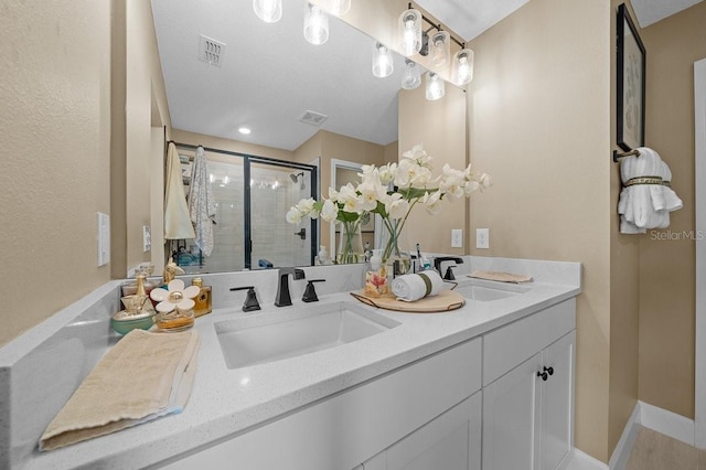 3916 Southern Vista Loop, Saint Cloud, FL 34772 - full bathroom with double vanity and a shower stall