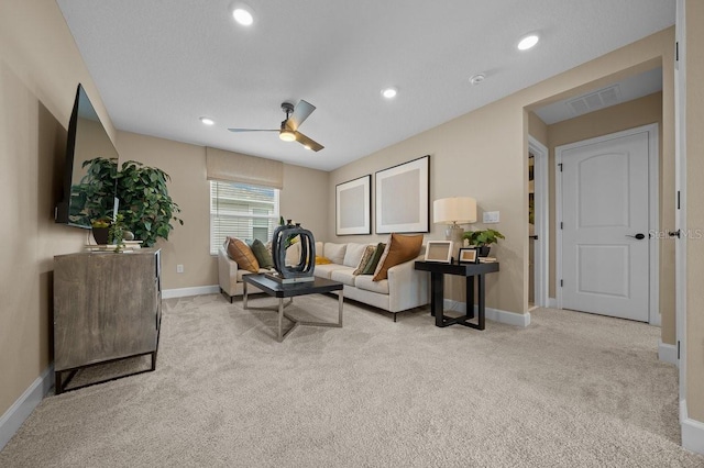 3916 Southern Vista Loop, Saint Cloud, FL 34772 - living area featuring light carpet, ceiling fan, and recessed lighting
