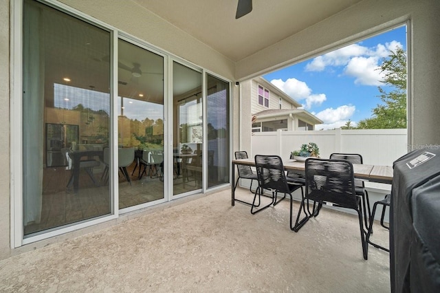 3916 Southern Vista Loop, Saint Cloud, FL 34772 - sunroom / solarium with outdoor dining space and a ceiling fan
