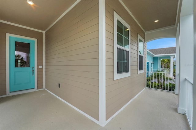 983 Fiesta Key Cir, Lady Lake, FL 32159 - property entrance featuring a porch