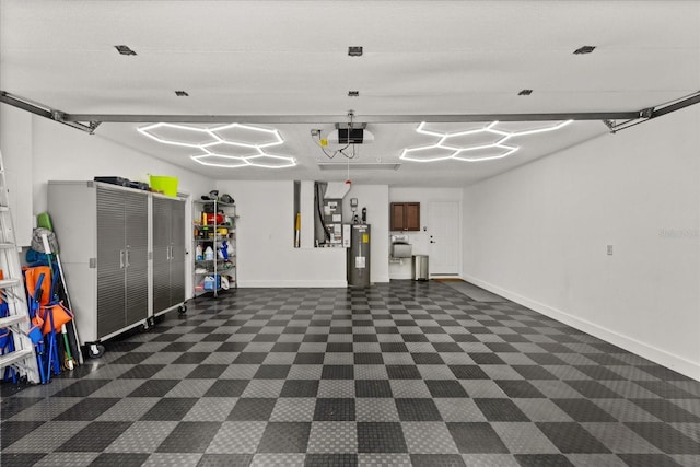 17525 SE 111th Cir, Summerfield, FL 34491 - garage featuring electric water heater and baseboards