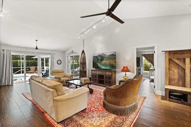 17525 SE 111th Cir, Summerfield, FL 34491 - living room featuring vaulted ceiling, ceiling fan, hardwood / wood-style flooring, and track lighting