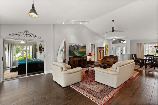 17525 SE 111th Cir, Summerfield, FL 34491 - living area featuring vaulted ceiling, a ceiling fan, and dark wood finished floors
