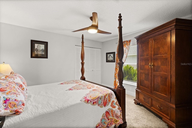 17525 SE 111th Cir, Summerfield, FL 34491 - bedroom with light carpet and a ceiling fan