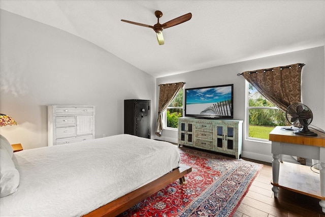 17525 SE 111th Cir, Summerfield, FL 34491 - bedroom with vaulted ceiling, multiple windows, wood finished floors, and ceiling fan