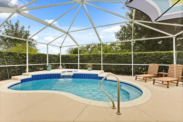 17525 SE 111th Cir, Summerfield, FL 34491 - view of swimming pool with a patio area, glass enclosure, and a pool with connected hot tub