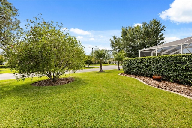 17525 SE 111th Cir, Summerfield, FL 34491 - view of grassy yard featuring a lanai