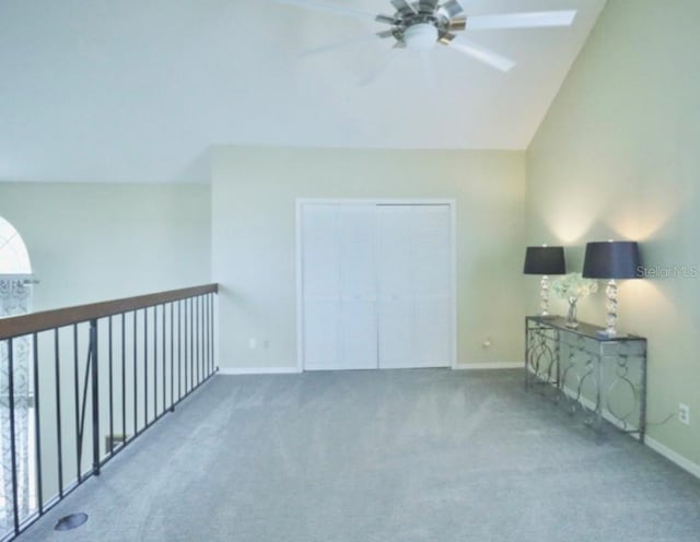 7938 Tumblestone Dr, Orlando, FL 32819 - additional living space with a ceiling fan, carpet flooring, and lofted ceiling