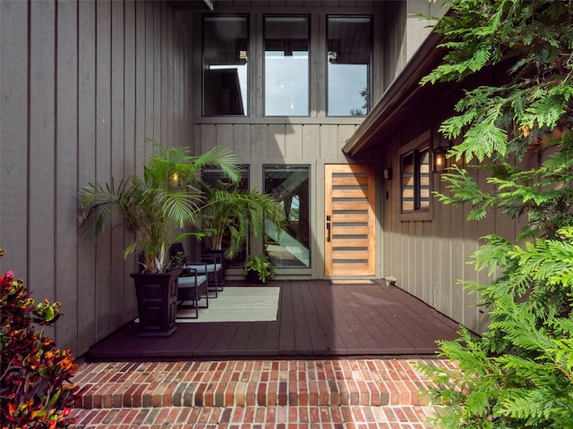 1978 Brantley Cir, Clermont, FL 34711 - property entrance featuring a wooden deck