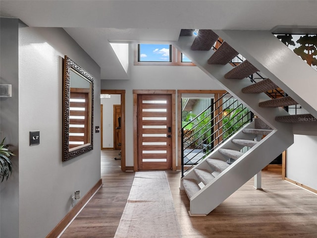 1978 Brantley Cir, Clermont, FL 34711 - foyer featuring wood finished floors and stairs