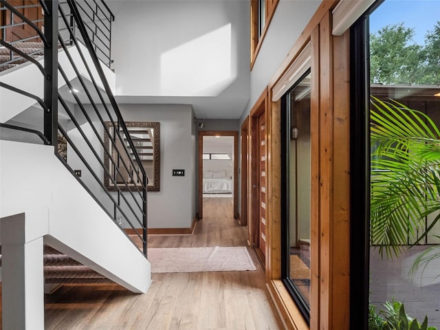 1978 Brantley Cir, Clermont, FL 34711 - foyer entrance with stairway and wood finished floors