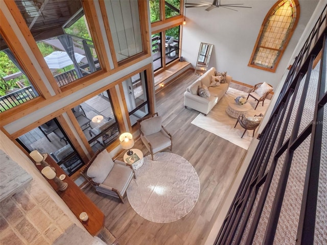 1978 Brantley Cir, Clermont, FL 34711 - living area featuring wood finished floors and a ceiling fan