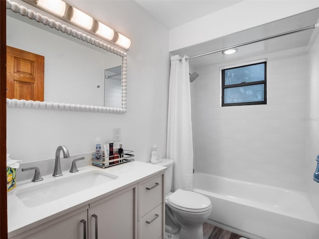 1978 Brantley Cir, Clermont, FL 34711 - bathroom featuring vanity, shower / bath combo with shower curtain, and wood finished floors