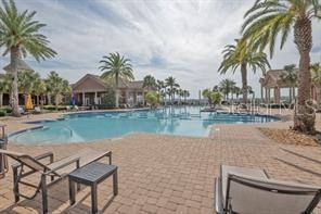 370 Salt Marsh Ln, Groveland, FL 34736 - community pool featuring a patio area