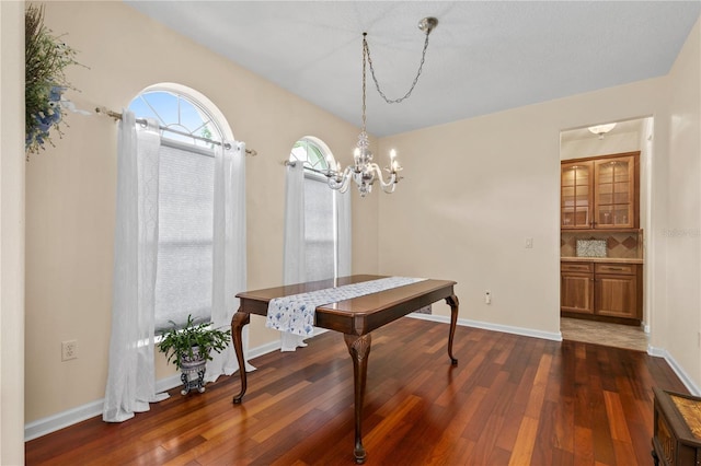 7811 Laurel View Dr, Mount Dora, FL 32757 - dining space featuring a chandelier and dark wood-style floors