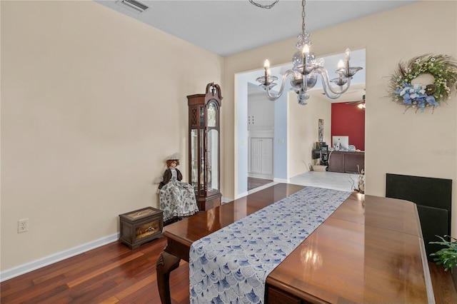 7811 Laurel View Dr, Mount Dora, FL 32757 - dining area with a chandelier and wood finished floors