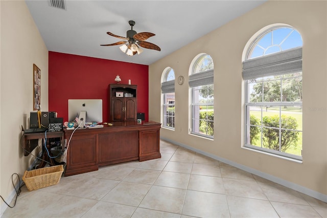 7811 Laurel View Dr, Mount Dora, FL 32757 - office with plenty of natural light, a ceiling fan, an accent wall, and light tile patterned floors