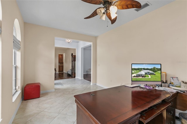 7811 Laurel View Dr, Mount Dora, FL 32757 - home office featuring light tile patterned floors, a ceiling fan, and a chandelier