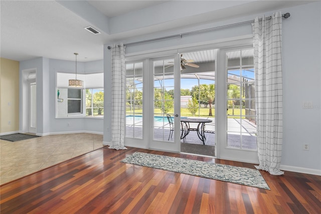 7811 Laurel View Dr, Mount Dora, FL 32757 - doorway to outside featuring ceiling fan and wood finished floors