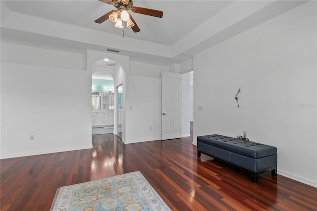 7811 Laurel View Dr, Mount Dora, FL 32757 - empty room featuring arched walkways, ceiling fan, and wood finished floors