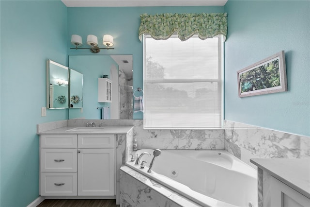 7811 Laurel View Dr, Mount Dora, FL 32757 - full bathroom featuring vanity, a jetted tub, and a shower