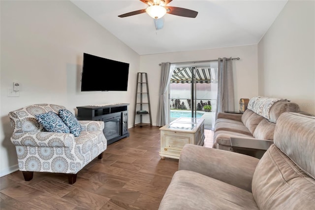 2305 Foxtree Rd, Tavares, FL 32778 - living area featuring lofted ceiling, a ceiling fan, and dark wood-type flooring