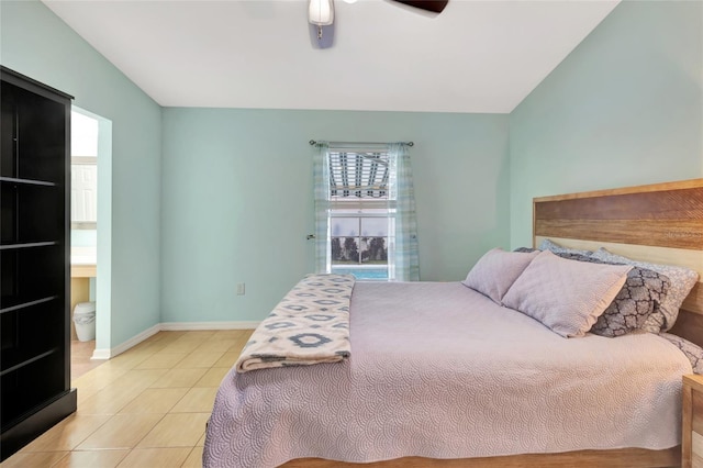 2305 Foxtree Rd, Tavares, FL 32778 - tiled bedroom featuring baseboards and ceiling fan