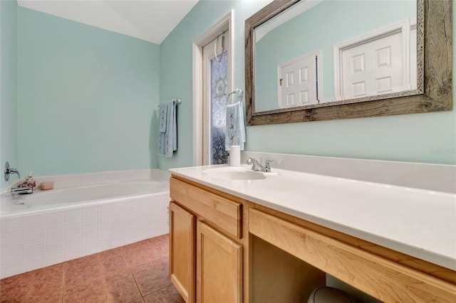 2305 Foxtree Rd, Tavares, FL 32778 - full bath with a garden tub, vanity, and tile patterned flooring