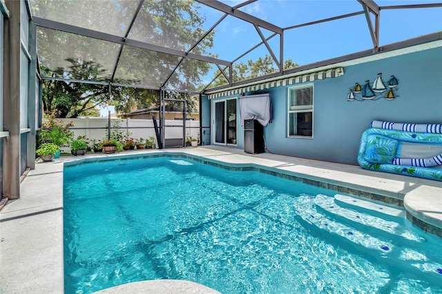 2305 Foxtree Rd, Tavares, FL 32778 - view of pool with a patio and glass enclosure