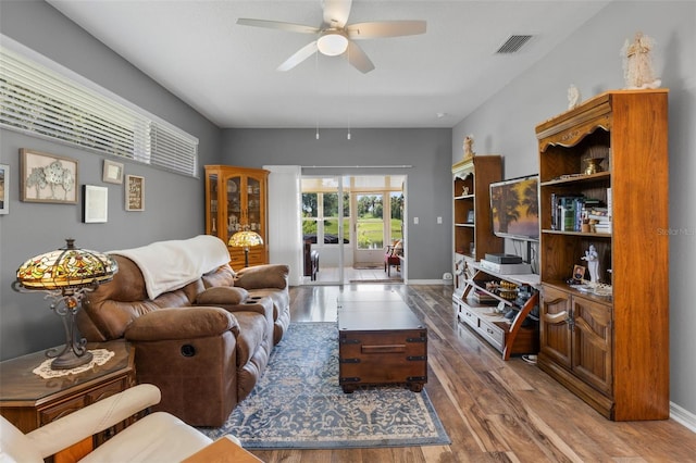 6307 Berkshire Pass, Leesburg, FL 34748 - living area featuring wood finished floors and ceiling fan