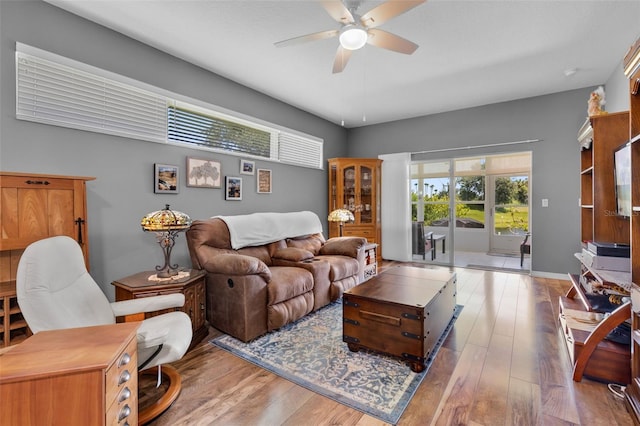 6307 Berkshire Pass, Leesburg, FL 34748 - living room with ceiling fan and hardwood / wood-style flooring