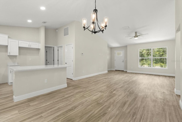 671 E Toledo Dr, Citrus Springs, FL 34434 - unfurnished living room with ceiling fan, a chandelier, light wood-style floors, and recessed lighting