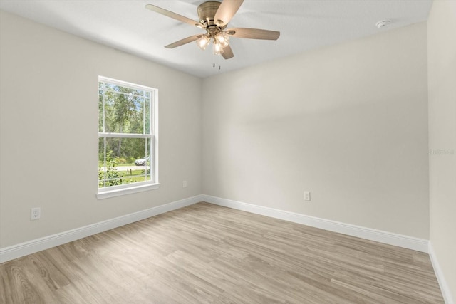 671 E Toledo Dr, Citrus Springs, FL 34434 - empty room featuring light wood-type flooring and a ceiling fan