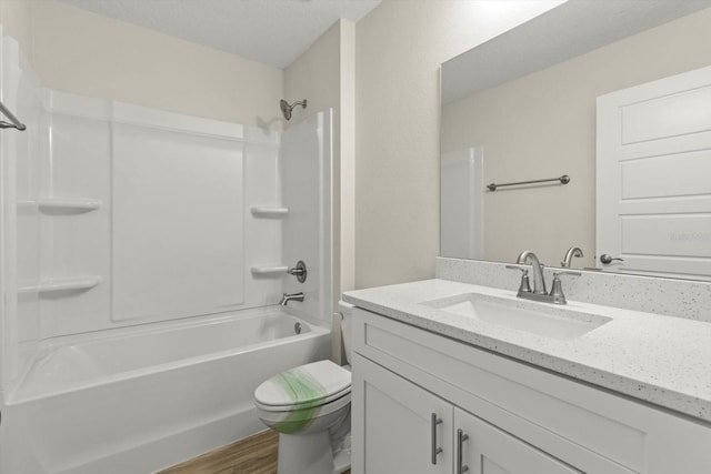 671 E Toledo Dr, Citrus Springs, FL 34434 - full bathroom with vanity, bathing tub / shower combination, and wood finished floors